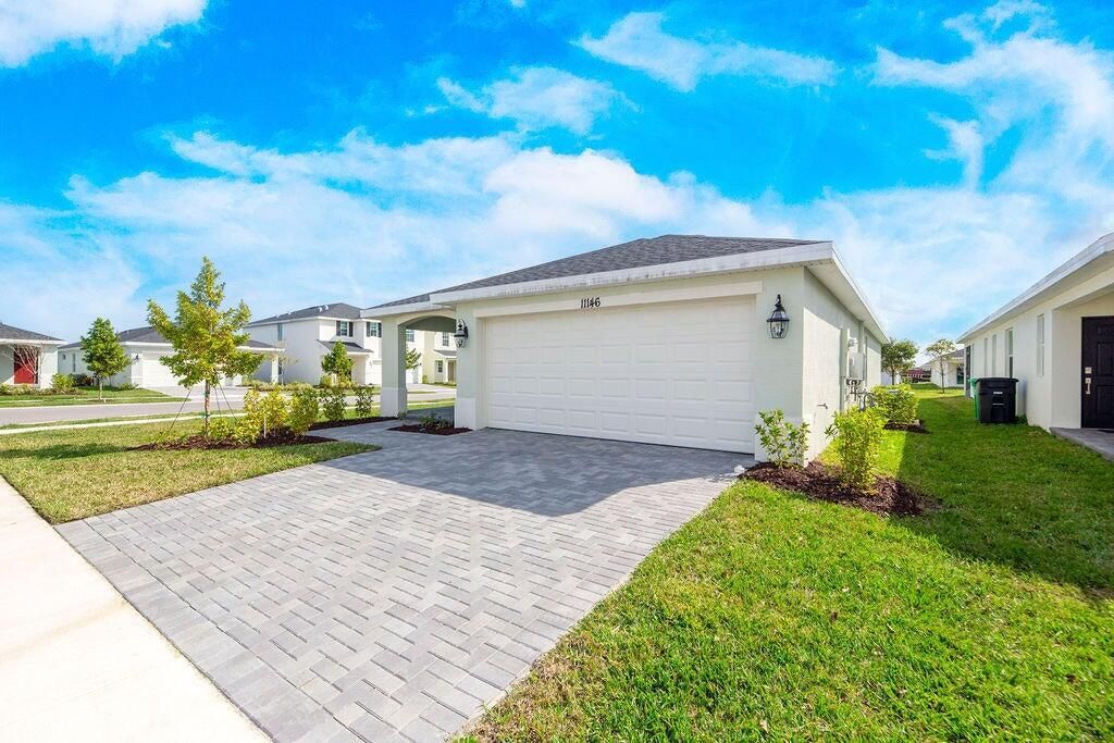 Photo of 11146 NW Fernbrook Drive, Port Saint Lucie, FL 34987 (MLS # R11154089)