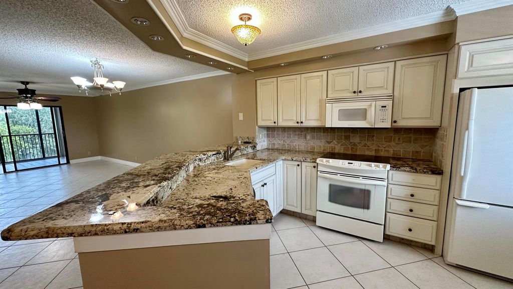 Photo of 2238 N Cypress Bend Drive #405, Pompano Beach, FL 33069 (MLS # R10903793)