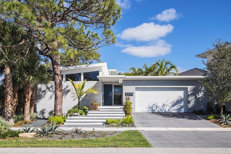 Unlike any other! The one you’ve been waiting for. Elevated on lot to new code.  Custom built and designed with every luxury feature. Approx. $600K in upgrades post construction.  The volume of the spaces is breathtaking!  The light is amazing!  Disappearing doors bring the outside in. The pool and terrace are an oasis. Terrazzo floors throughout the first floor. 13 foot beamed ceilings. Kitchen with island, peninsula & top-of-the-line appliances. The Primary Bedroom & spa-like bath perfectly situated on the main level. The additional bedrooms with hardwood floors & en-suite baths are privately located on the second level…the most beautiful architectural staircase takes you to them. Over-sized two-car garage, powder room & large laundry room complete this home.  Can be sold furnished.