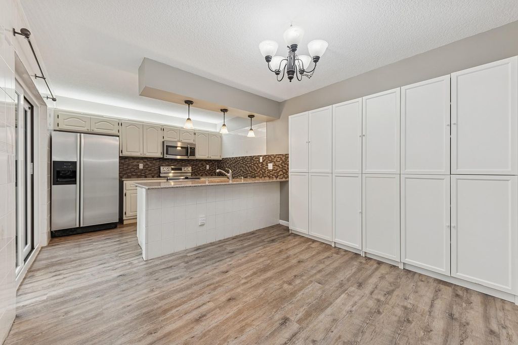 Photo of 1155 SW 118th Terrace, Davie, FL 33325 (MLS # B26013364)