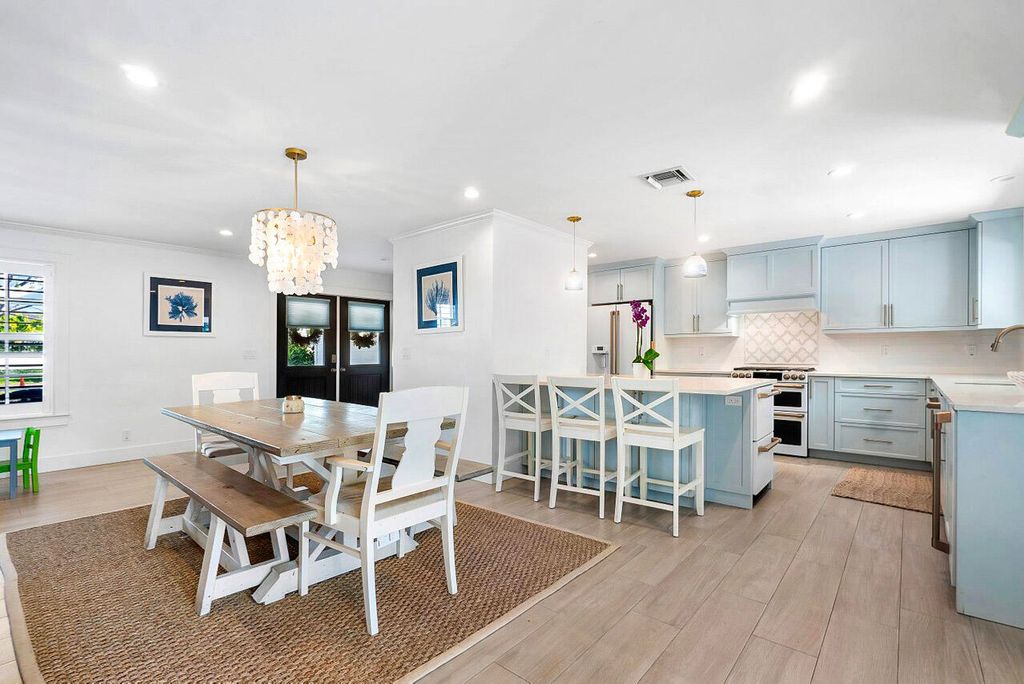 Photo of 700 Lakeside Circle, North Palm Beach, FL 33408 (MLS # R10973937)