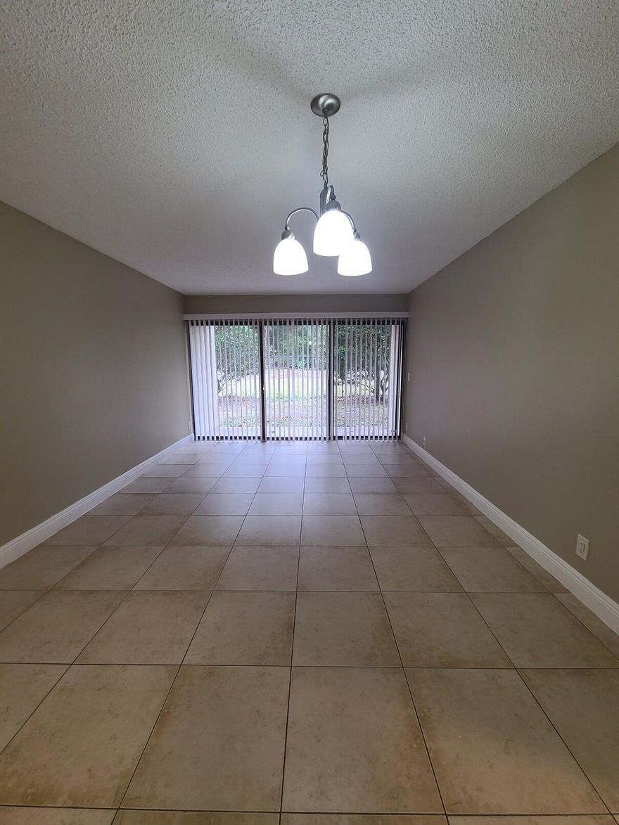 Beautiful 3 Bedroom / 2 Bathroom First Floor Condo in Palm Beach Place Condominium! This spacious unit features tile flooring throughout the living and dining areas, with brand newer laminate flooring in the bedrooms. Enjoy the convenience of a full-size washer and dryer in-unit. The community offers fantastic amenities including a pool, gym, and onsite manager. Located just minutes away from the Turnpike, and conveniently close to I-95 and major roads. Don't miss out on this wonderful rental opportunity