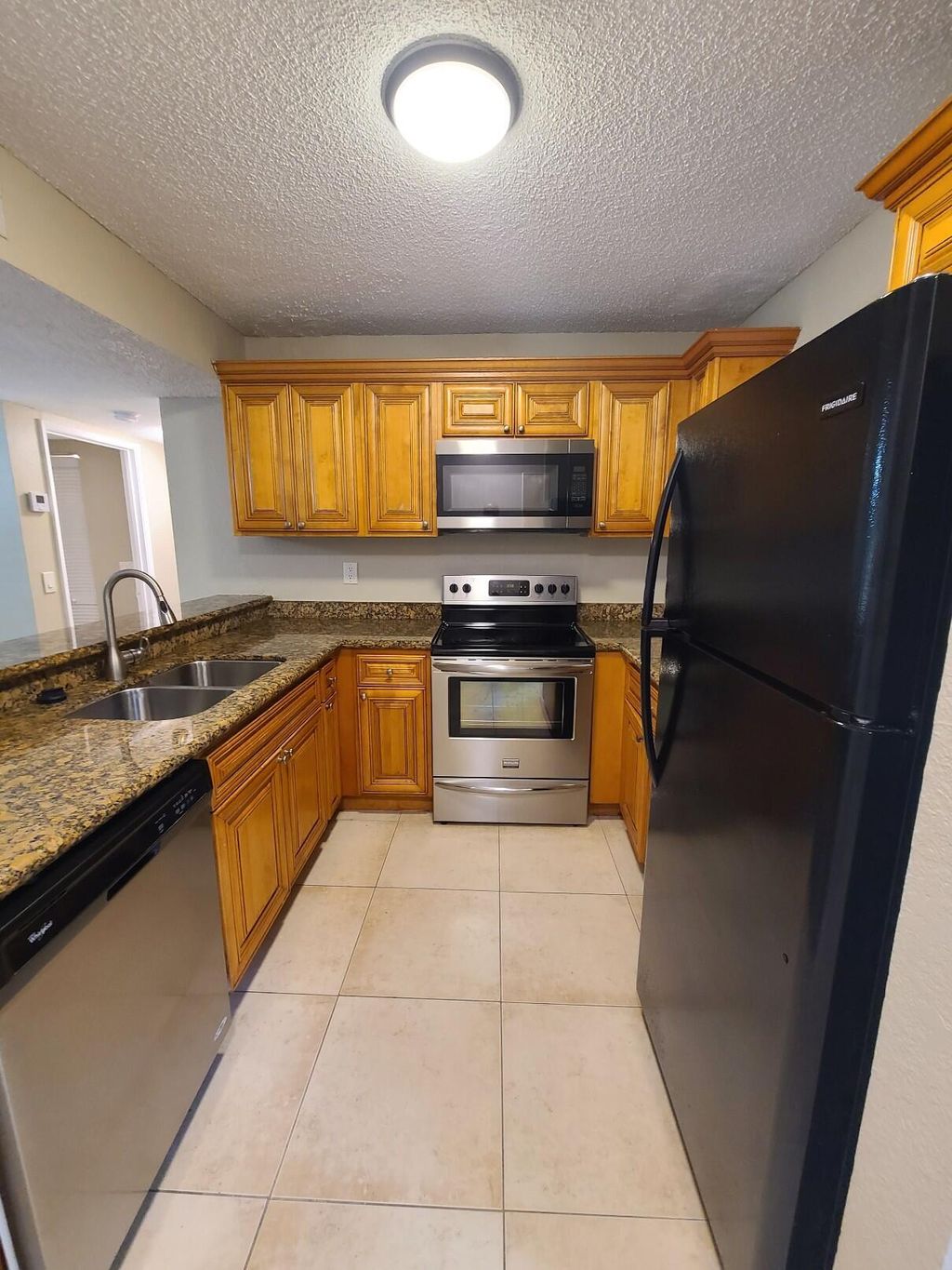 Photo of 1601 Windorah Way #C, West Palm Beach, FL 33411 (MLS # B26016652)