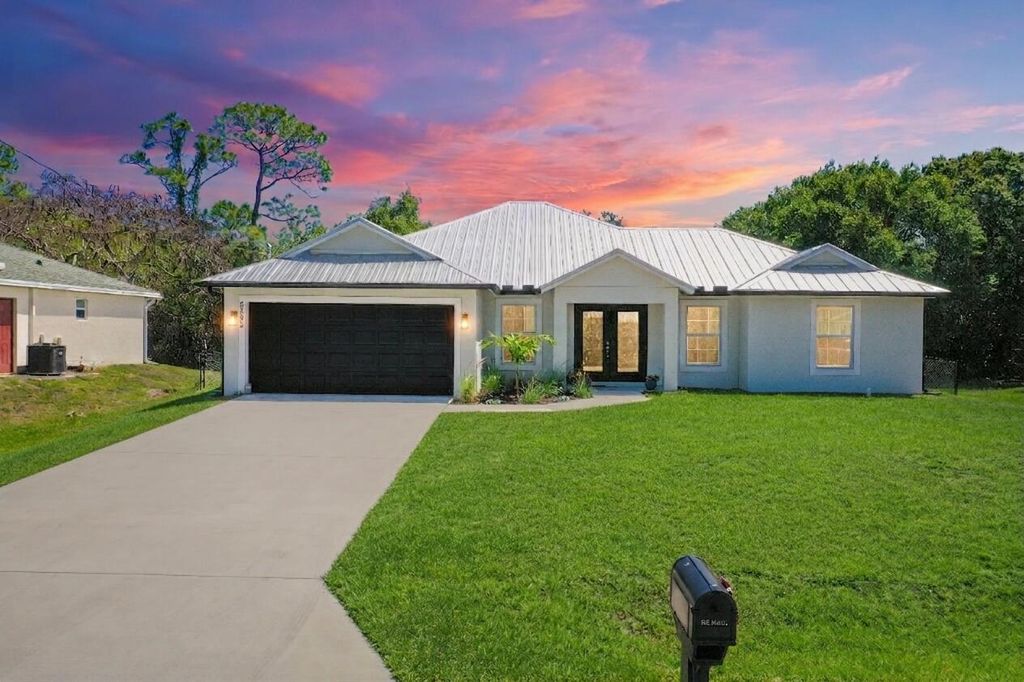 Photo of 5302 Seagrape Drive, Fort Pierce, FL 34982 (MLS # B26012555)