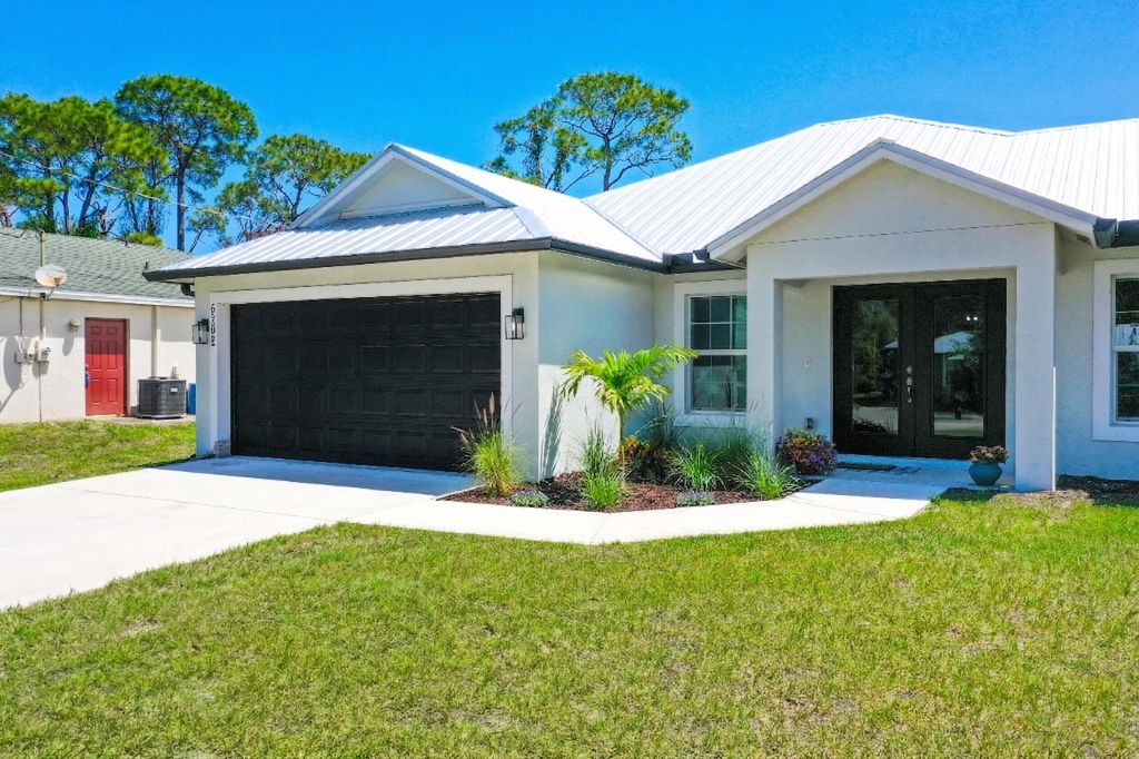 Photo of 5302 Seagrape Drive, Fort Pierce, FL 34982 (MLS # B26012555)