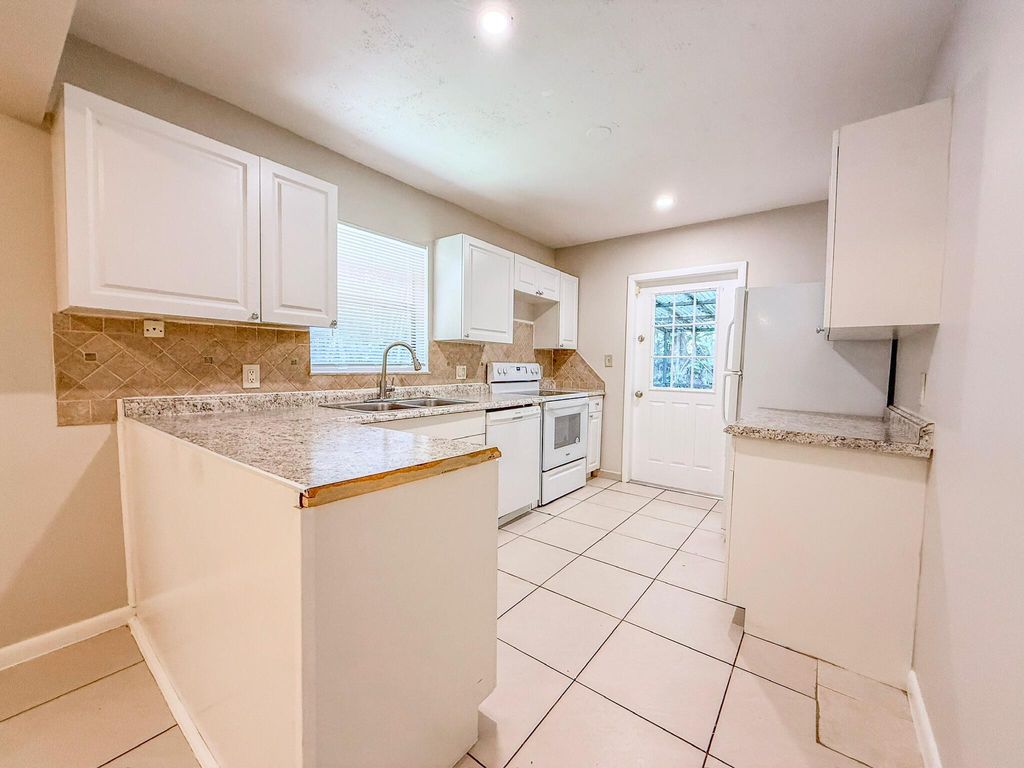 Photo of 7458 E Plumosa Lane, Lake Worth, FL 33467 (MLS # R11116005)