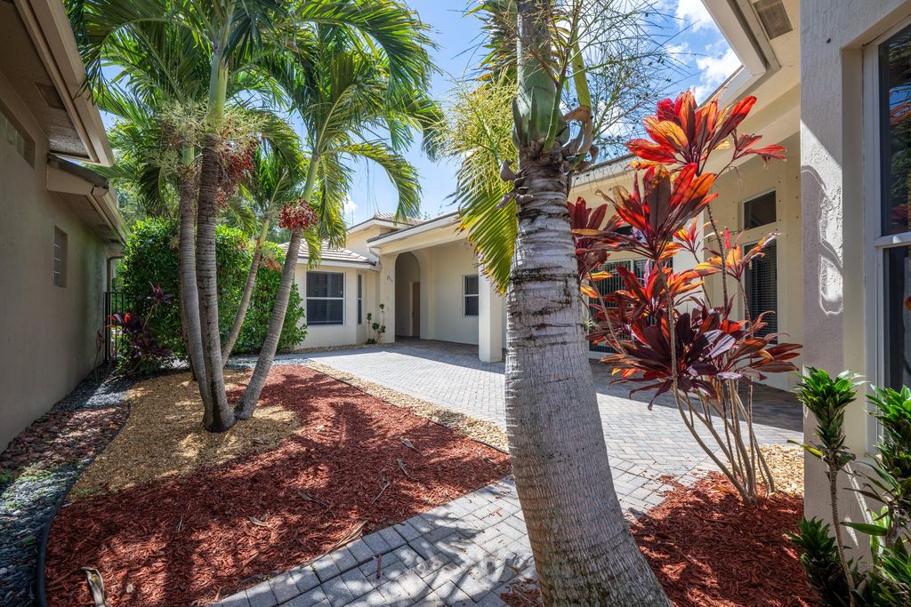 Photo of 9357 Osprey Isles Boulevard, West Palm Beach, FL 33412 (MLS # B26030207)