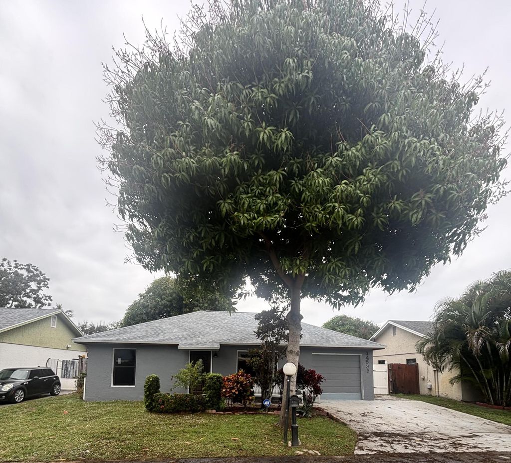 Photo of 14539 Wood Pine Drive, Delray Beach, FL 33445 (MLS # R11159386)