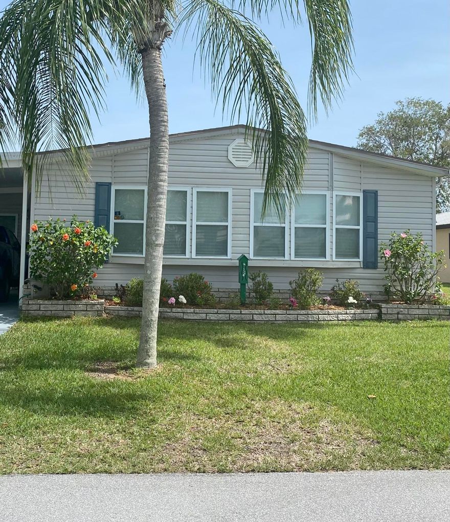 BEST DEAL EVER ON THIS SPACIOUS 2/2 home with an open kitchen floor plan and a lovely Florida Room. This home is definitely an entertainment home with the open concept and large living area.  Located in the beautiful Spanish Lakes Fairway 55+ community. This community has many amenities including Golf, Tennis Courts and a heated Pool.  Call today for your private showing.
