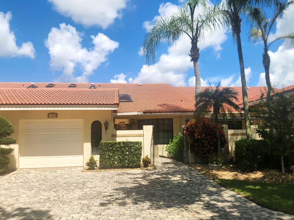 Photo of 2649 DEER CREEK EMERALD WAY Circle, Deerfield Beach, FL 33442 (MLS # B26078523)