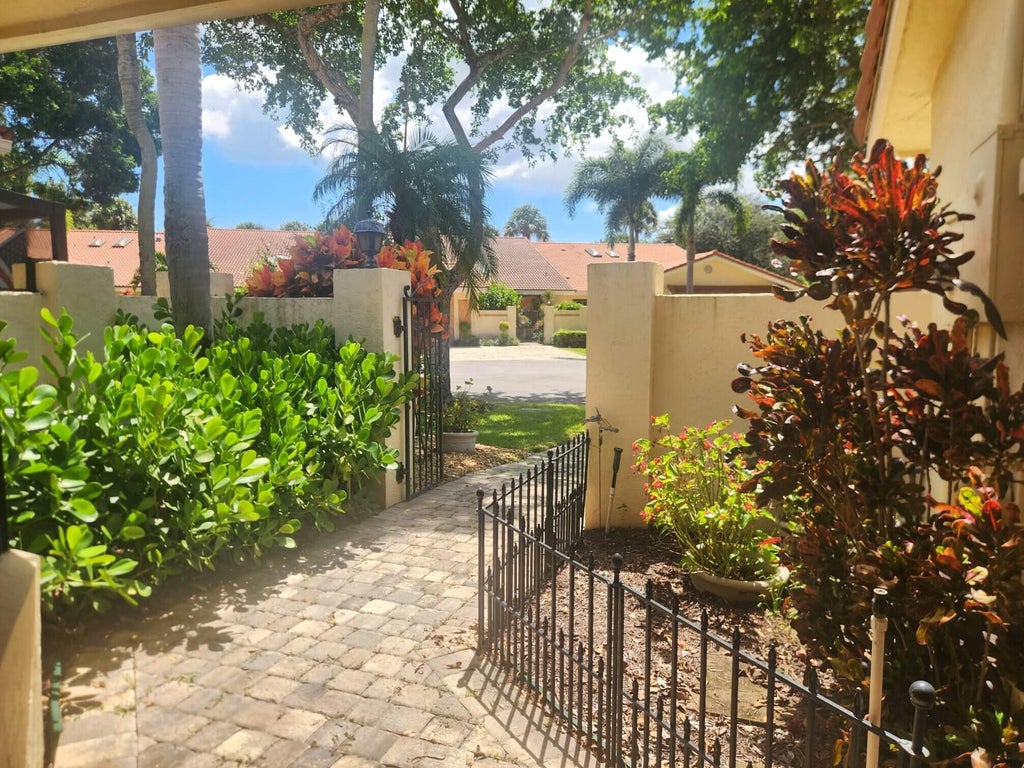 Photo of 2649 DEER CREEK EMERALD WAY Circle, Deerfield Beach, FL 33442 (MLS # B26078523)