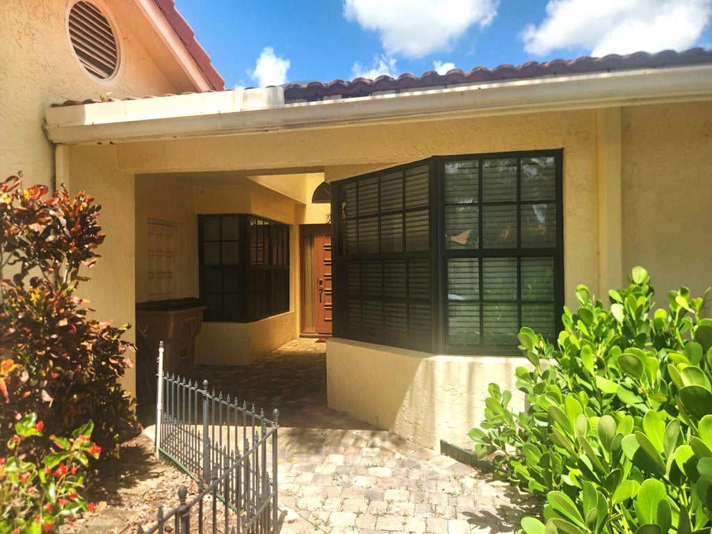 Photo of 2649 DEER CREEK EMERALD WAY Circle, Deerfield Beach, FL 33442 (MLS # B26078523)