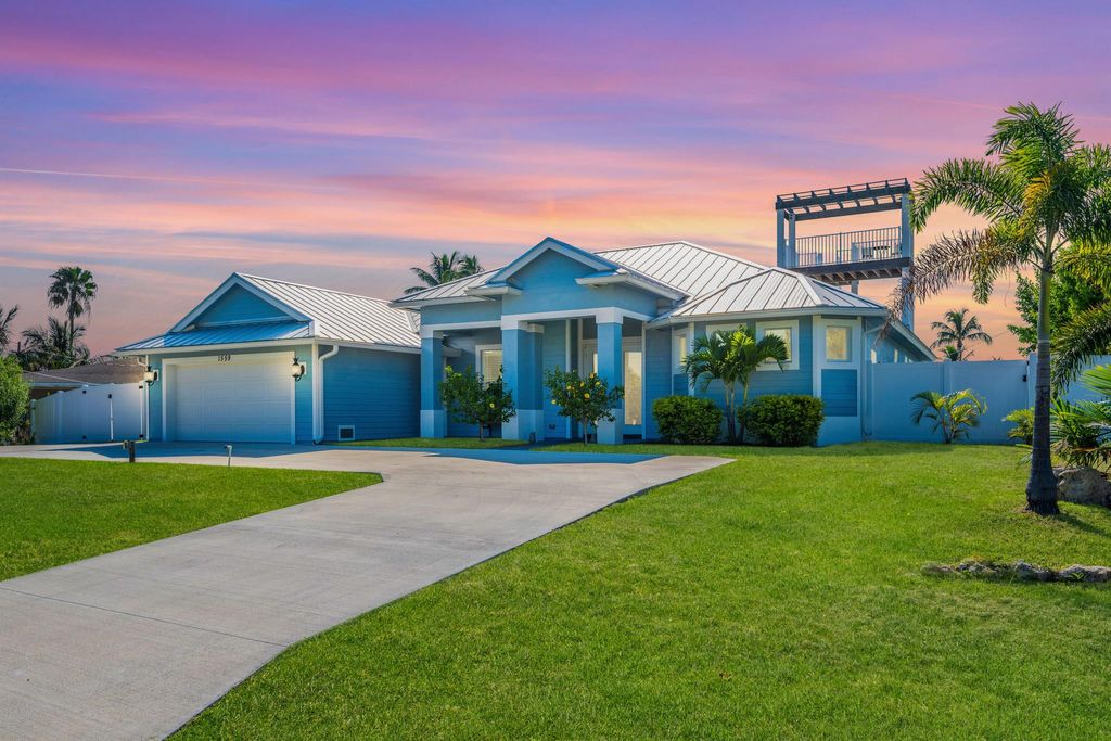 Photo of 1559 Thumb Point Drive, Hutchinson Island, FL 34949 (MLS # R10918623)