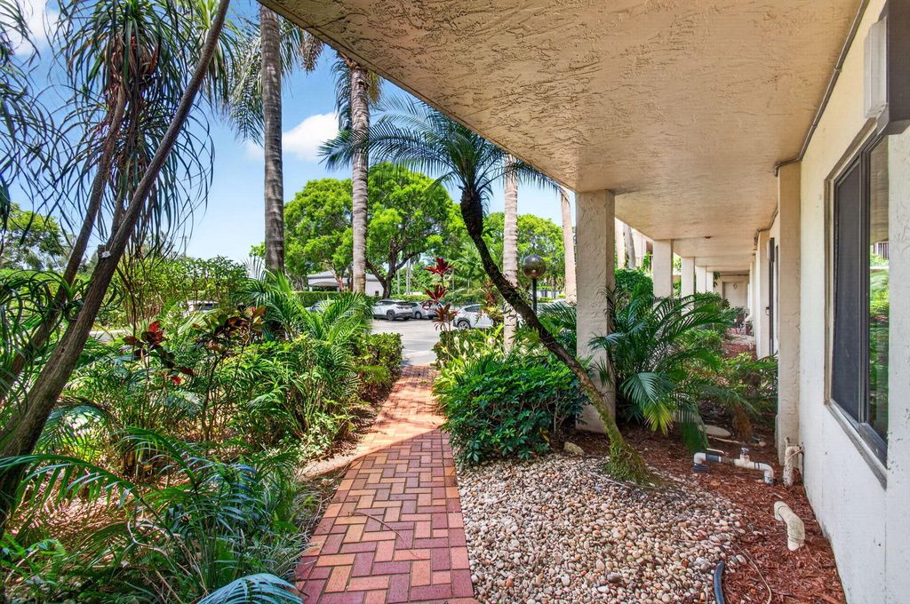 Photo of 6655 Kensington Lane, Delray Beach, FL 33446 (MLS # B26032150)