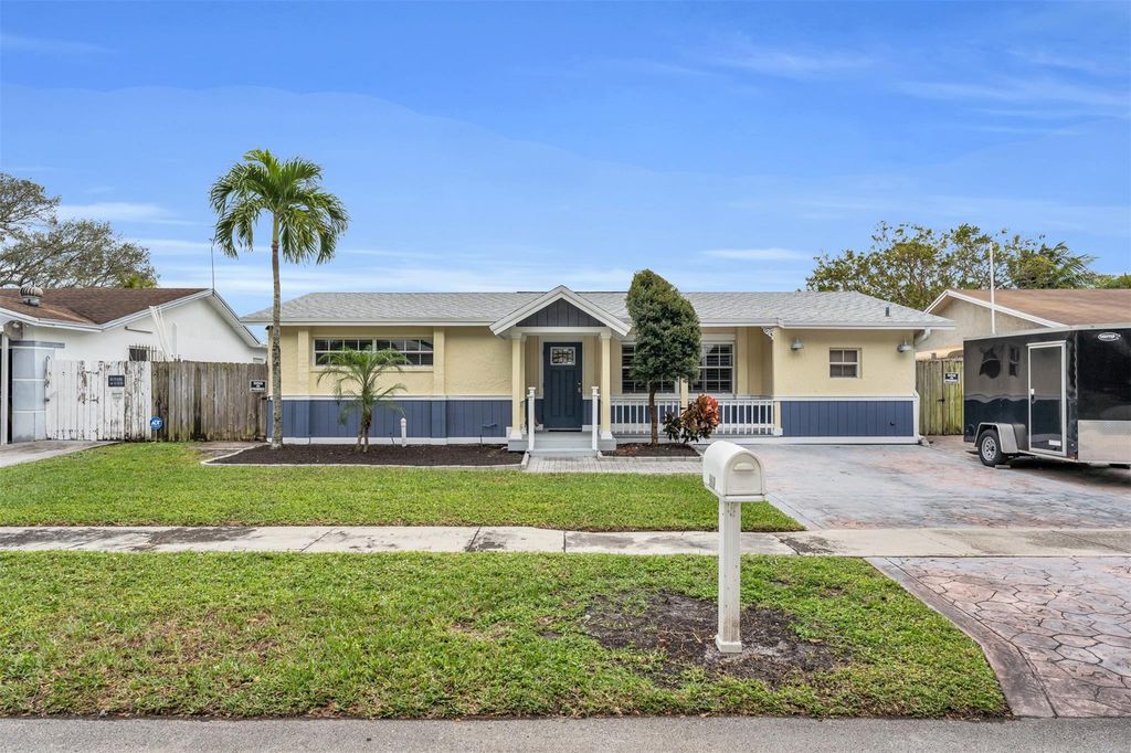 Photo of 9860 NW 3rd Street, Pembroke Pines, FL 33024 (MLS # B26018832)