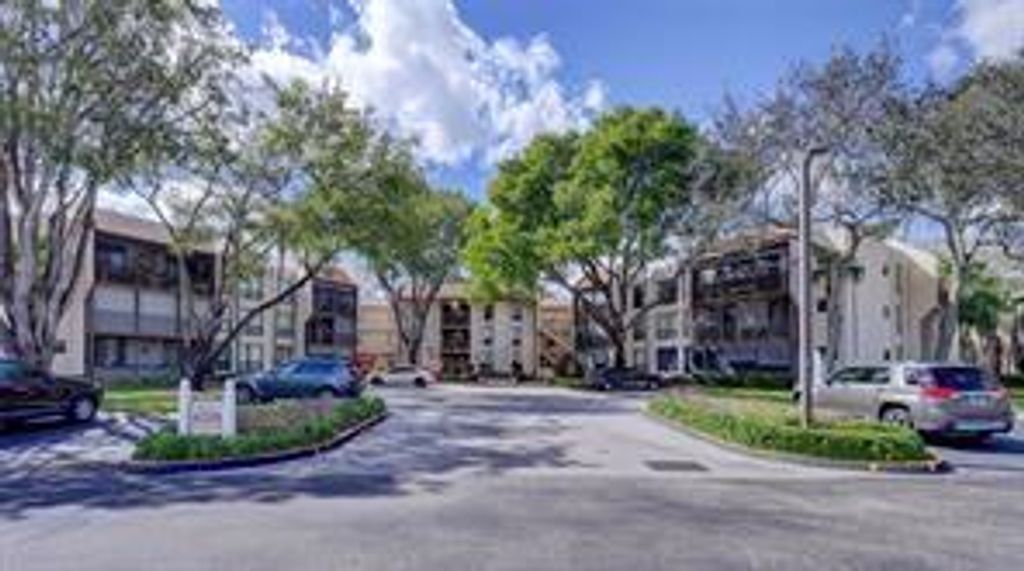 Photo of 6701 N University Dr #216, Tamarac, FL 33321 (MLS # F10534184)