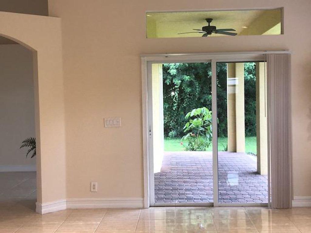 Photo of 1202 SW Parma Avenue, Port Saint Lucie, FL 34953 (MLS # R10952993)