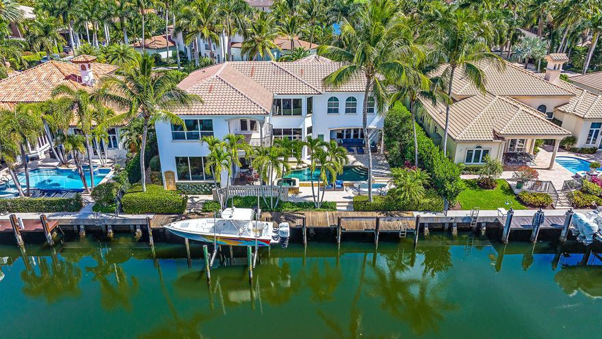 Welcome to Harbour Isles: A very private, gated, Waterfront community with deep water, ocean access, 24-hour manned guardhouse, and under 100 homes. 90' canal frontage can accommodate up to a 70ft yacht, or multiple boats with lift. This meticulously maintained, custom design built home has fantastic curb appeal with its large Chicago brick driveway and oversized 3-car garage. The backyard faces a lush preserve, offering serene views and privacy to relax with no homes across the canal. The back features a summer kitchen, Ipe Brazilian hardwood dock, custom landscape and pool lighting. The home has recently been painted inside and outside. (See supplemental...)