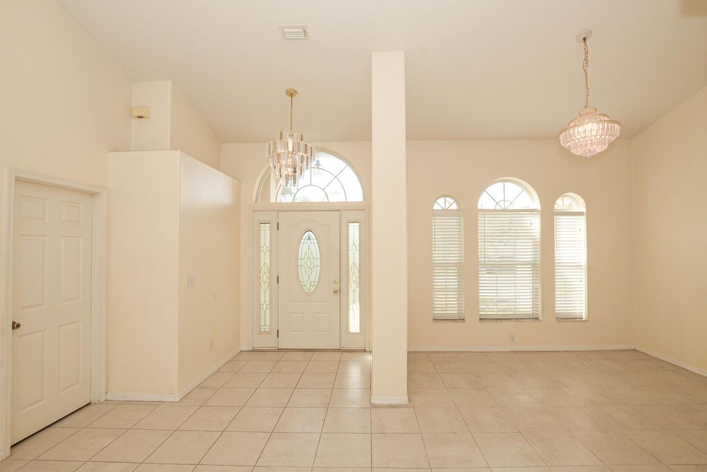 Photo of 731 SE Browning Avenue, Port Saint Lucie, FL 34983 (MLS # R11134924)