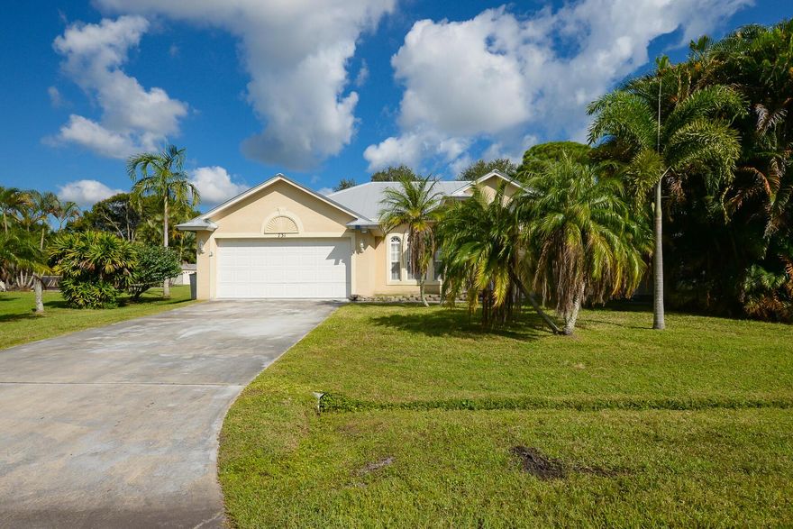 Solid CBS 3 bedroom 2 bath home in the heart of Port St Lucie has so much potential.  Recent improvements include metal roof 2021, HVAC 2021, water heater 2022. Nicely designed split floorplan features a separate formal dining, living room, breakfast area, and spacious open kitchen to family room.  Primary bedroom and bath offers dual sinks two walk-in closets, separate tub and shower.  Large private backyard has plenty of room for a pool.  Home is in need of TLC and updates.  Great investment opportunity.  Centrally located to area parks, beaches, major highways, and popular Treasure Coast attractions.