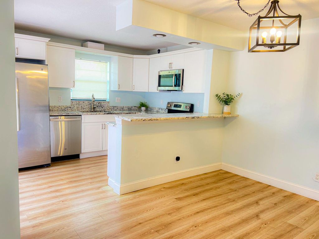 Photo of 1302 Nebraska Avenue #1c, Fort Pierce, FL 34950 (MLS # R11095717)