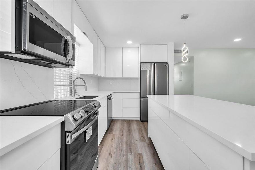 This stunning first-floor corner unit is an ideal investment or a dream home for any homeowner. Recently renovated with meticulous attention to detail, this residence boasts fully permitted upgrades, including new plumbing and electrical systems throughout. Enjoy serene garden views! The highlight is the high-end modern kitchen, The beautifully updated bathrooms include a luxurious walk-in showers, while the enclosed, air-conditioned porch offers a peaceful retreat overlooking a lush garden. Long-term tenant pays $2,200 per month and is willing to stay, ensuring a great CAP rate for investors. 55+ community, residents can enjoy three heated pools, indoor and outdoor Jacuzzis, golf, theaters, clubs, unlimited social activities .Priced to sell—don't miss out on this exceptional opportunity!