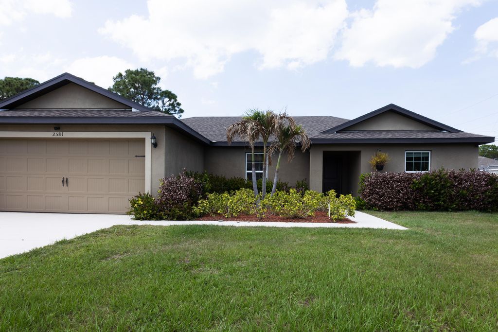 Photo of 2581 SE Dogwood Avenue, Port Saint Lucie, FL 34952 (MLS # B26025401)