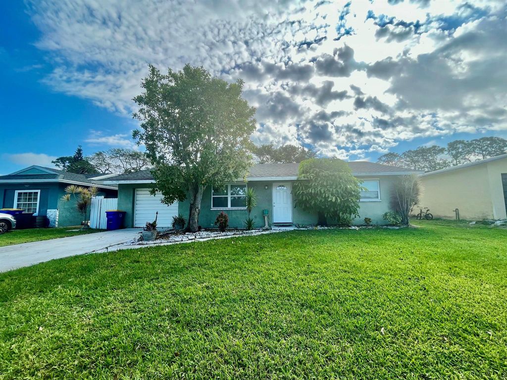 Photo of 5619 SE Normandy Avenue, Stuart, FL 34997 (MLS # R11068187)