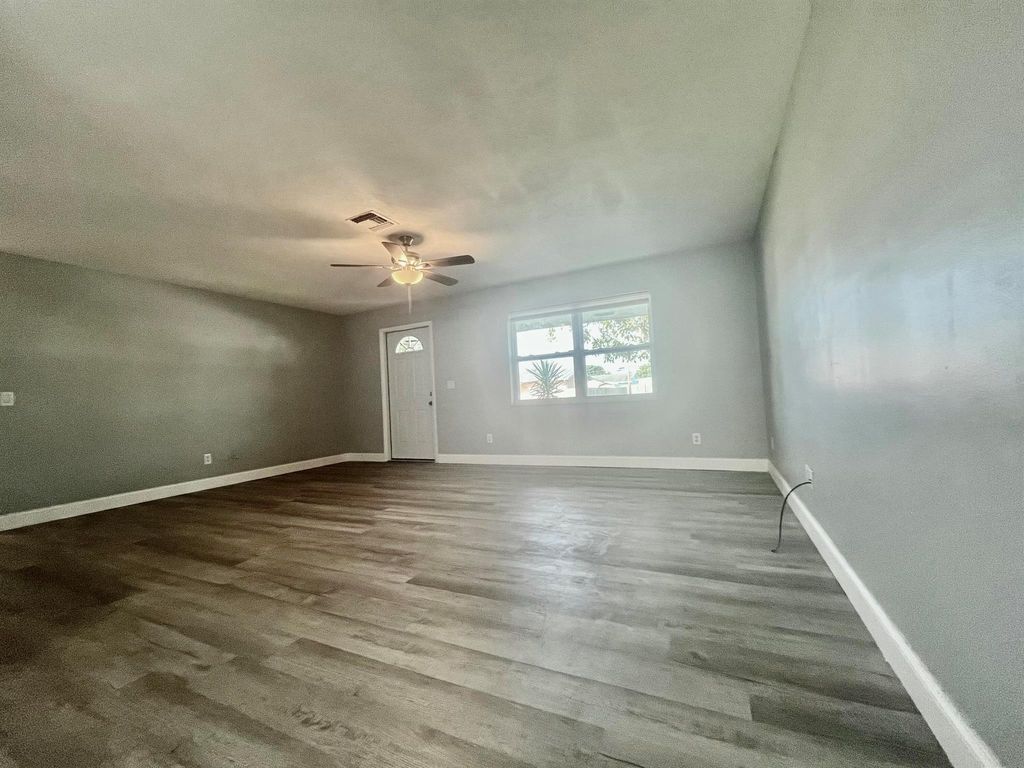 Photo of 5619 SE Normandy Avenue, Stuart, FL 34997 (MLS # R11068187)