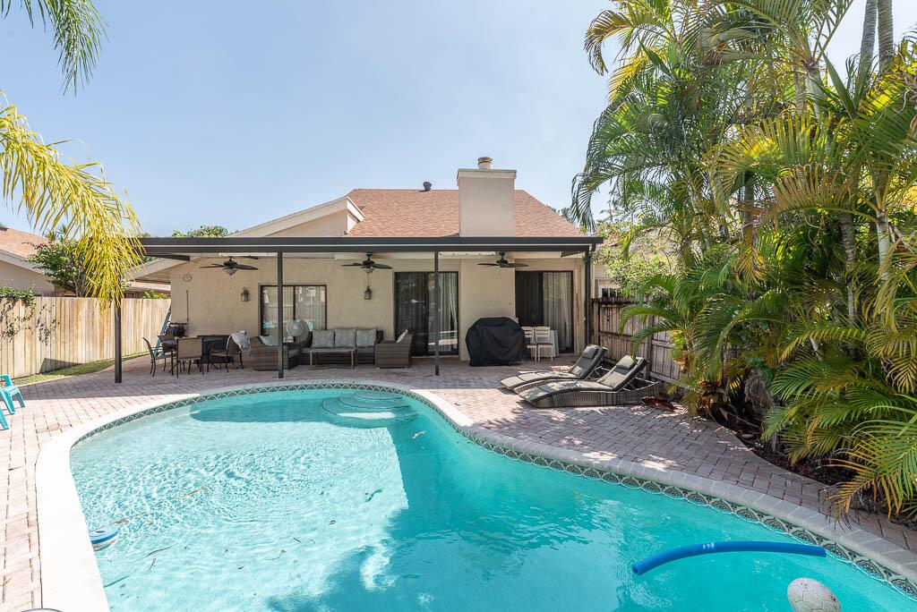 Rarely available home in central Boca Raton. This house offers 3 bedroom + 1 den and 2 & 1/2 bath. The master is downstairs and the den and kids bedrooms are upstairs. It has renovated bathrooms and floors, an open kitchen to the breakfast corner, a formal dining and a large living room with vaulted ceilings. There is 2 outside areas to hang out, the back of the house has a pool and has a covered patio, and the front has a large courtyard. AVAILABLE 06/01/2023