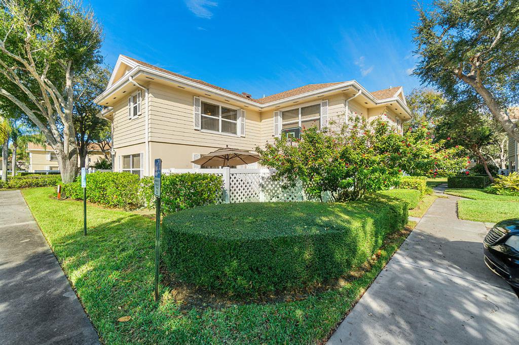 ONLY UNIT ON THE MARKET...Highly desirable, quality built and well maintained 2 bedroom, 2.5 bath corner unit townhouse with spacious fenced-in courtyard patio in Lake Clarke shores. Newer Samsung appliances, updated faucets, a/c (2012), tile, carpet and laminate wood flooring, central vacuum, ample closet space with organizers and two master suites. Pet friendly community with tennis courts, playground, pool and spa, walking trails along the lake and 24/7 guarded gate. The HOA covers 24/7 manned-gated security, water, sewer, basic cable, roof repairs and replacement, community landscaping, exterior building maintenance and exterior insurance. MUST SEE!