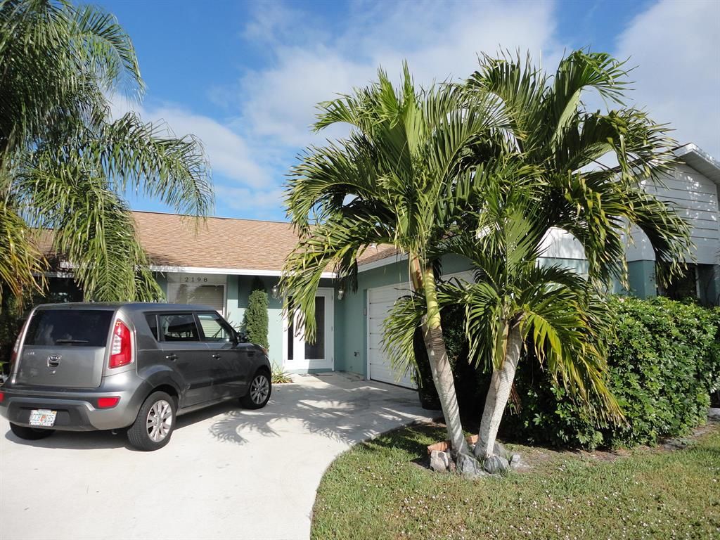 Photo of 2198 SE Dolphin Road, Port Saint Lucie, FL 34952 (MLS # R10631244)