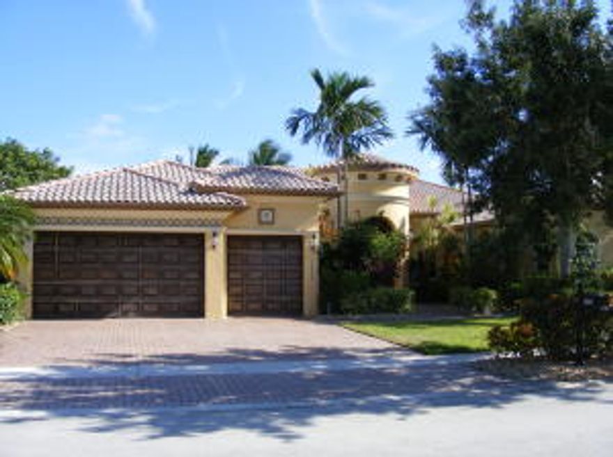 Beautiful large 5 bedrooms plus office with marble floors throughout common areas. Gorgeous open kitchen with hardwood cabinets and granite counter tops. Triple split floor plan with high ceilings throughout the entire home. Tropical private backyard with pool and a lake view from just about everywhere in the house. This is a perfect home for a big family with large bedrooms for all of the kids.