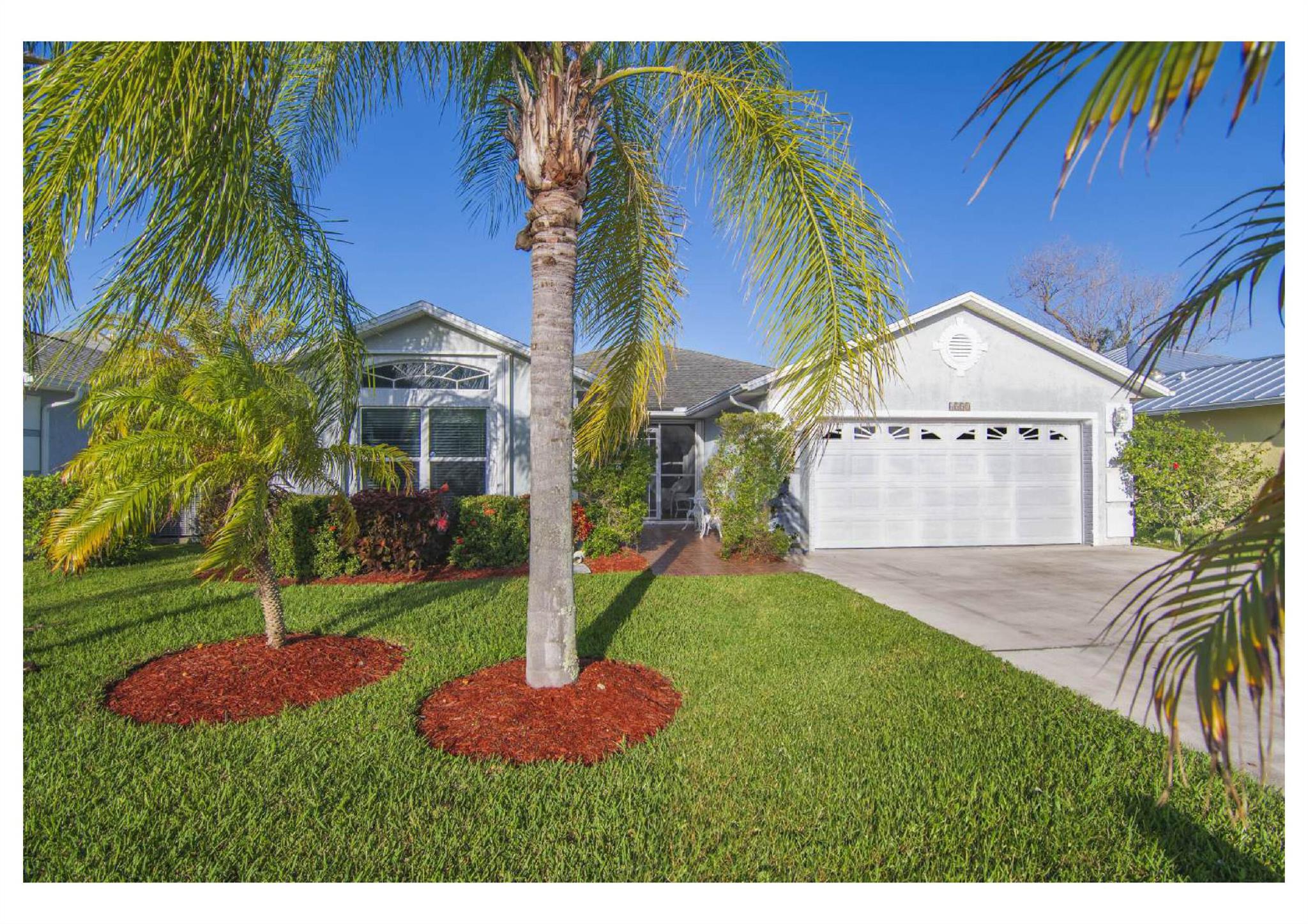 Stunning Sunsets await you!  Turn-key home in vibrant 55+ community on Leased Land.  Large entrance welcomes you into this beautifully decorated home on the lake.  Expansive back yard provides lots of privacy.   Upgraded flooring in this 3 bed, 2 bath contemporary home. Pets welcomed.