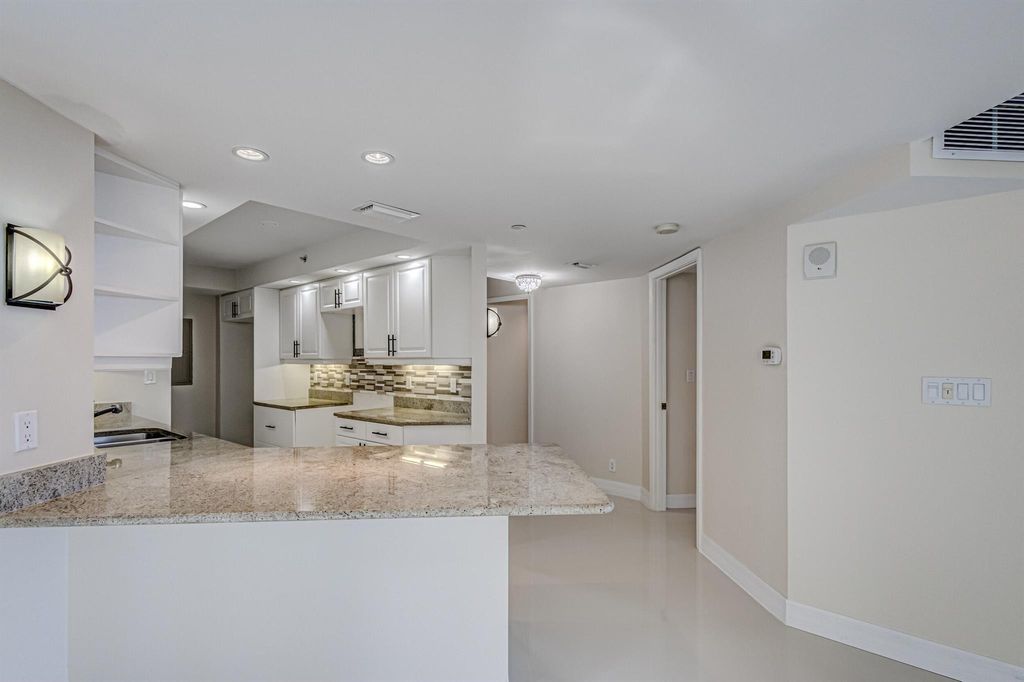 Photo of 3000 N Ocean Drive #2-F, Singer Island, FL 33404 (MLS # R10960854)