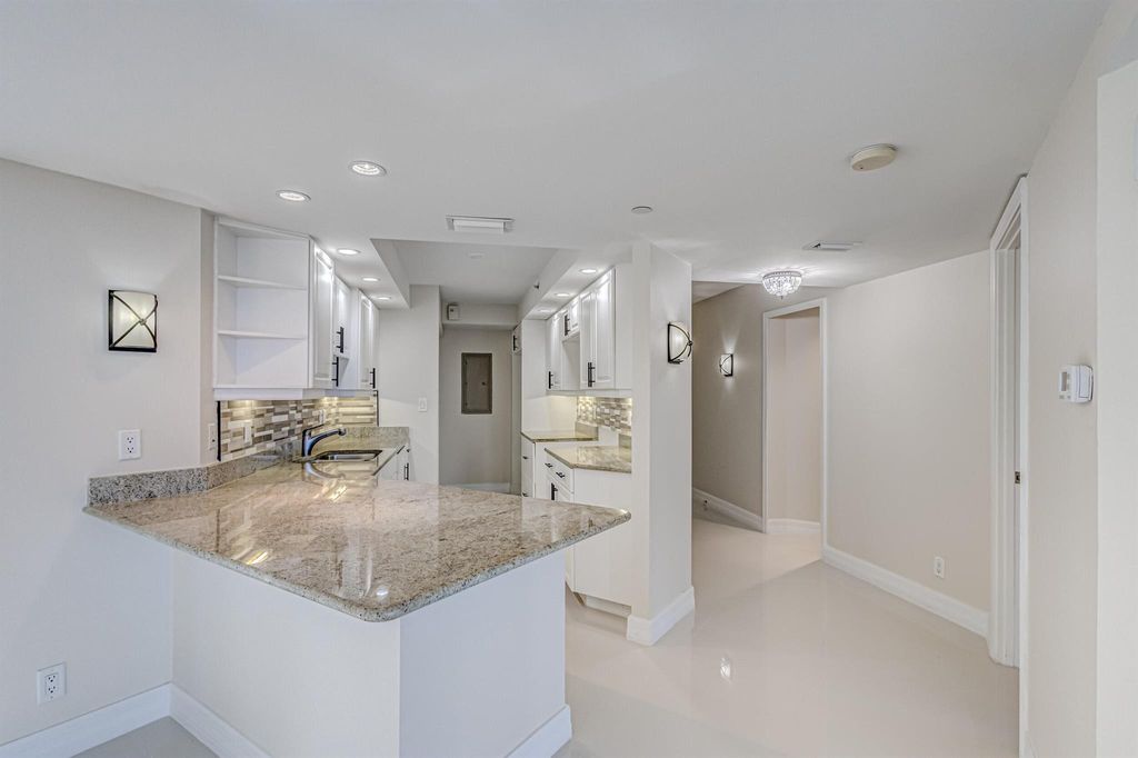 Photo of 3000 N Ocean Drive #2-F, Singer Island, FL 33404 (MLS # R10960854)