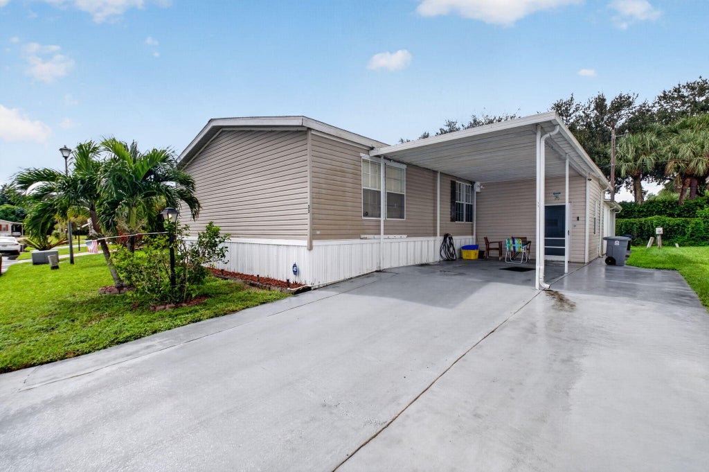 Photo of 12375 S Military Trail S #33, Boynton Beach, FL 33436 (MLS # B26092245)