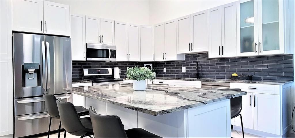 Photo of 5703 Golden Eagle Circle, Palm Beach Gardens, FL 33418 (MLS # R10882793)