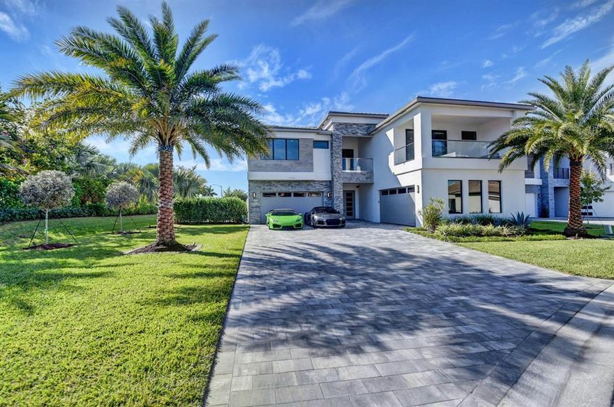 BACK ON MARKET! Dreaming of owning a better than model perfect home?LAKEFRONT,CORNER(only 1 neighbor) rare oversized lot(.27 acre) in LOTUS! MALDIVES MODEL W/ OVER $600k in UPGRADES!! 6 BRS-w/onsuite baths.(total 6.1 BA)Stunning salt water heated pool! Patio has summer kitchen that faces west to enjoy the sunsets. Extra long driveway accomodates 7 cars. Downstairs features 1 BR(currently used as office w/double built in desks),a great rm &game rm w/ built in bar. Upstairs- primary suite+4 addt'l guest suites& large loft area. Gourmet kitchen w/gas stove, 2 dishwashers, 48'' Upgraded Sub Zero Refrigerator,top of the line cabinetry, quartz countertops and SS appliances. Marble 24x24 flooring downstairs & Engineered wood floors upstairs. Glass staircase.Electric blinds. Glass wine closet