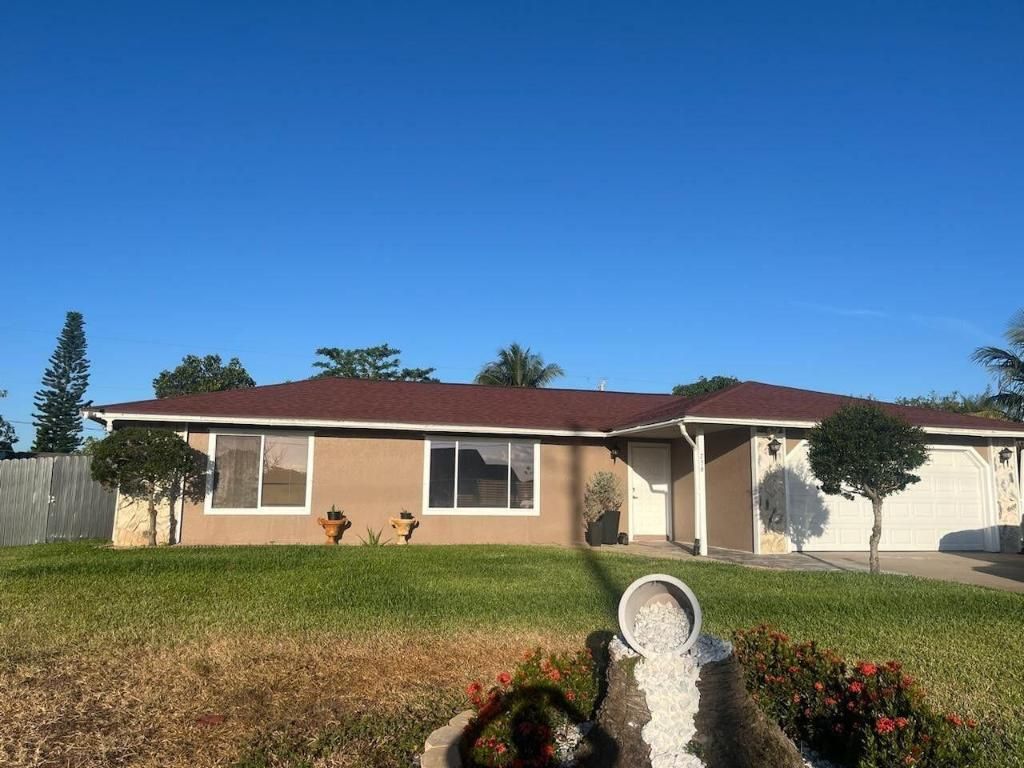 Photo of 756 SW Del Rio Boulevard, Port Saint Lucie, FL 34953 (MLS # R11145195)