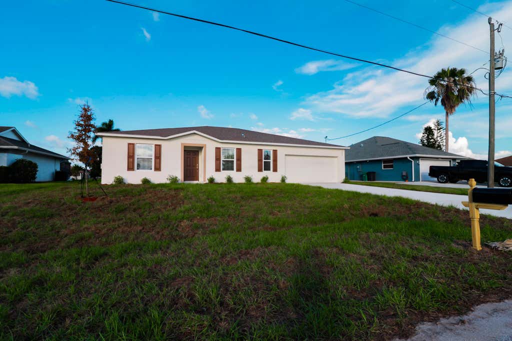 Photo of 2061 SE Mantua Street, Port Saint Lucie, FL 34952 (MLS # B26040937)