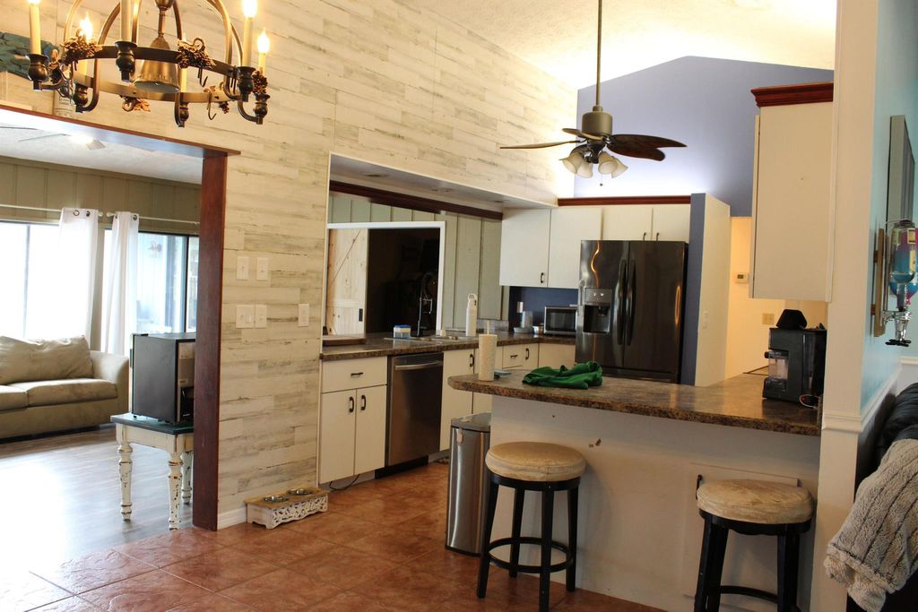 Photo of 418 SE Langfield Avenue, Port Saint Lucie, FL 34984 (MLS # R10990367)