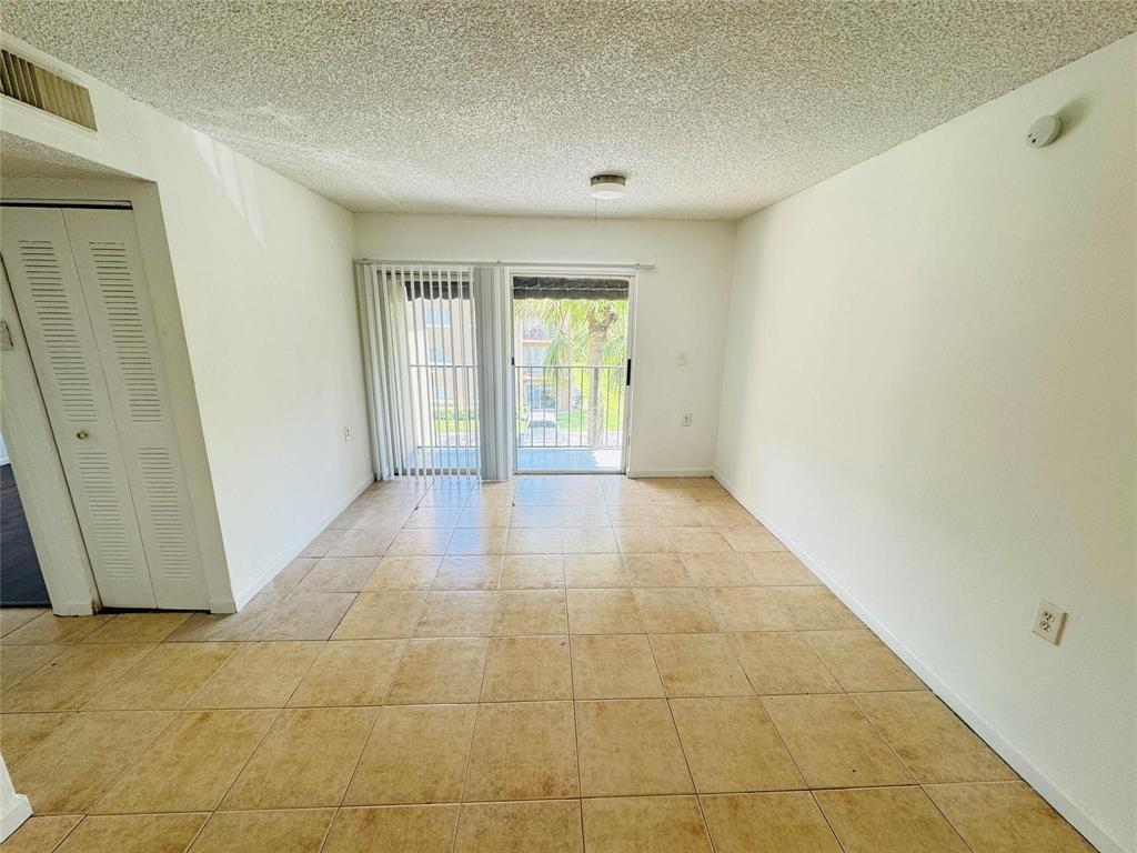 Photo of 1068 N Benoist Farms Road #302, West Palm Beach, FL 33411 (MLS # B26041817)