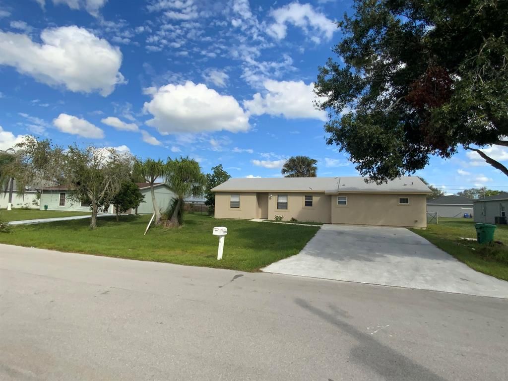 Photo of 3533 SW Rosardo Street, Port Saint Lucie, FL 34953 (MLS # R10754602)