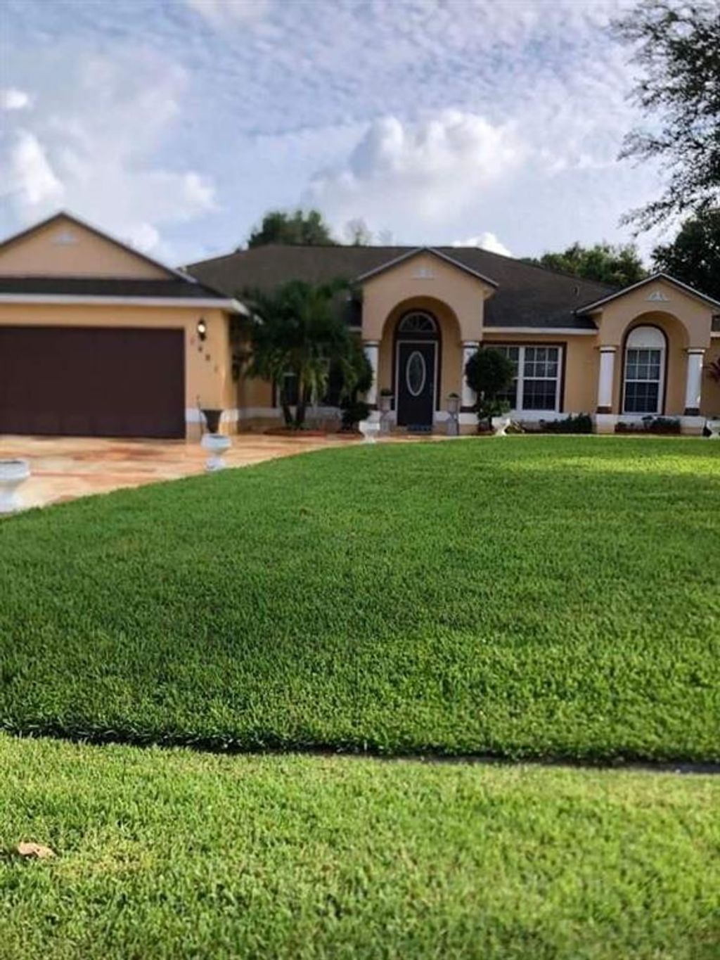 Photo of 1481 SW Algardi Lane Ln, Port St Lucie, FL 34953 (MLS # R10813123)