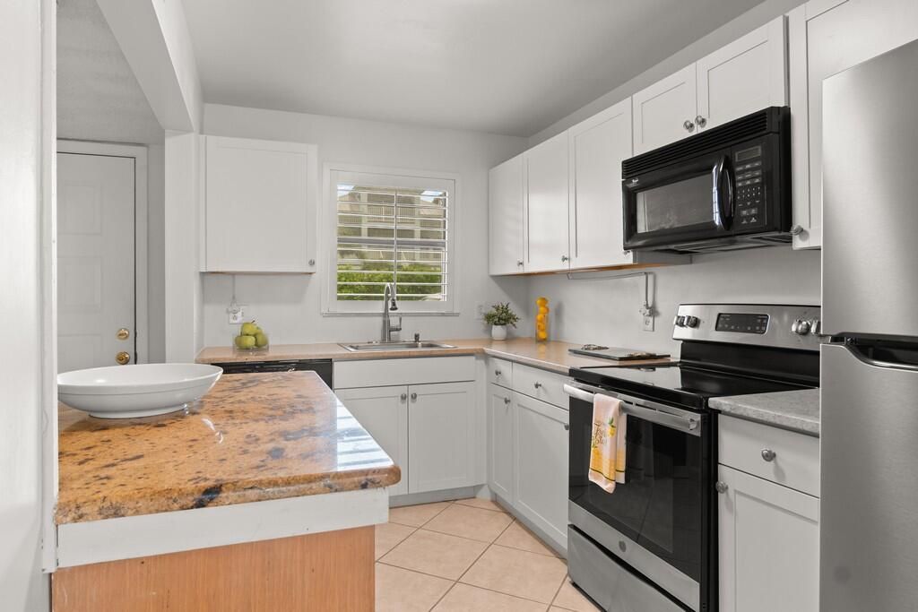 Photo of 1300 Seaway Drive #C1, Fort Pierce, FL 34949 (MLS # R11131519)