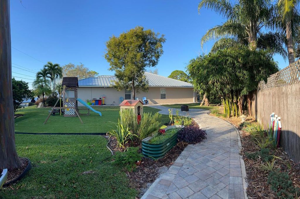 Photo of 3221 SE Quay Street, Port Saint Lucie, FL 34984 (MLS # R11149780)