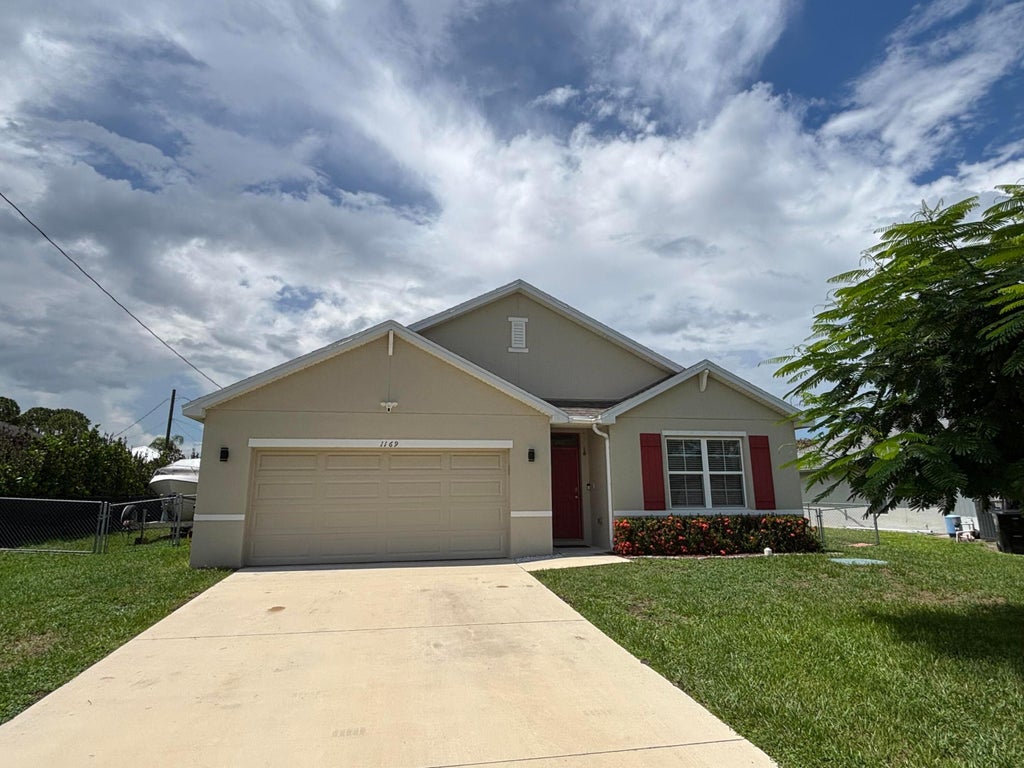 Photo of 1169 SW Hunnicut Avenue, Port Saint Lucie, FL 34953 (MLS # B26056515)