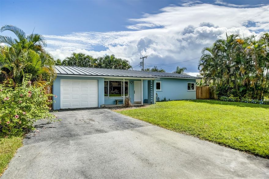 Discover the ideal Florida lifestyle in this charming 3-bed, 2-bath single family home, complete with a garage, convenient laundry room, and an enclosed back patio for relaxation. This prime location offers quick access to the beach and Pompano Beach Golf Course in under 10 minutes, while Pompano Citi Centre Shopping Mall, a cinema, Whole Foods, numerous dining options, as well as an elementary and middle school are all within a 5-minute drive. Fenced in back yard and impact windows for quiet privacy. Dogs or cats welcome preferably no more than 2 pets. You do not want to miss this, schedule your viewing today!