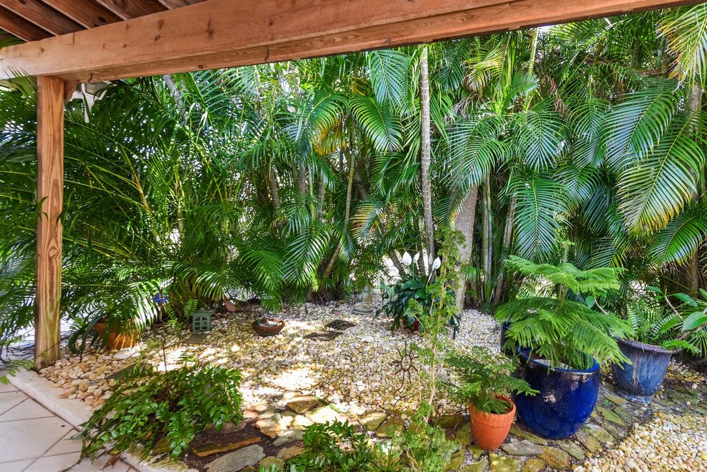 Photo of 1116 NE Oceanview Circle, Jensen Beach, FL 34957 (MLS # R11091511)